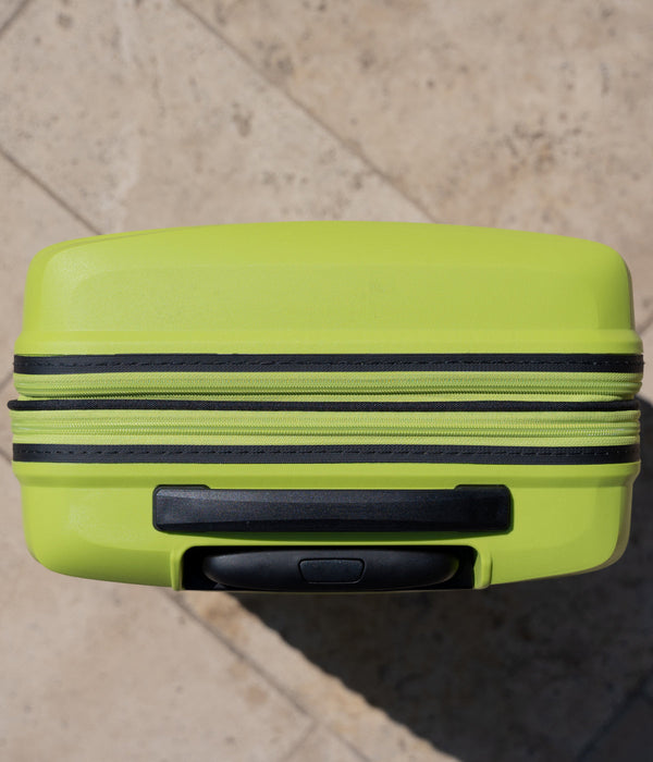 Comment changer la poignée de portage de ma valise rigide ?